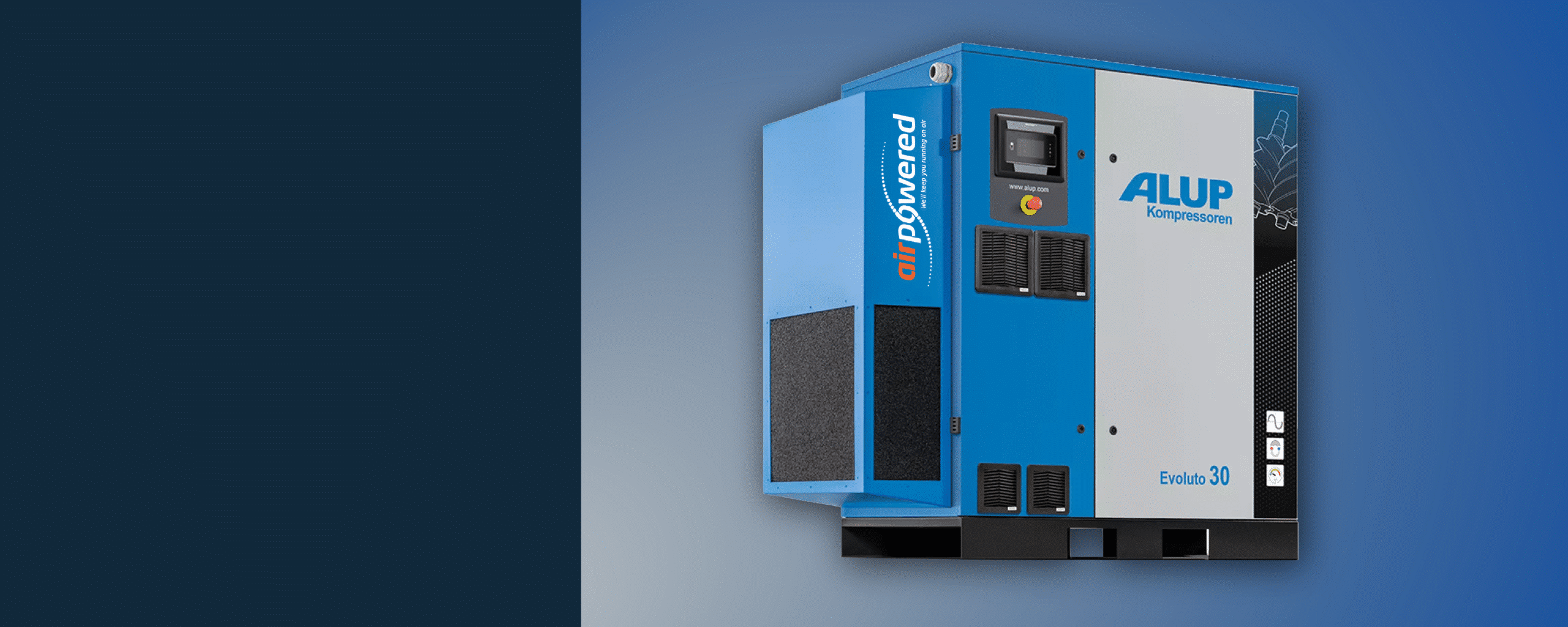 Variable-speed screw compressor operating in industrial workspace